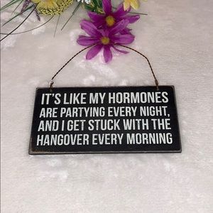 Wooden quoted plaque.